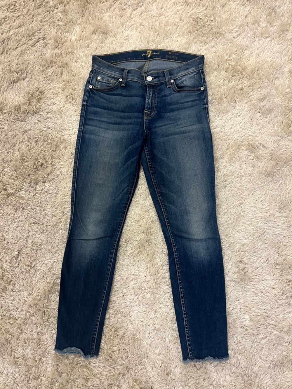 FOR ALL MANKIND indigo skinny stretch jeans with raw hem.
